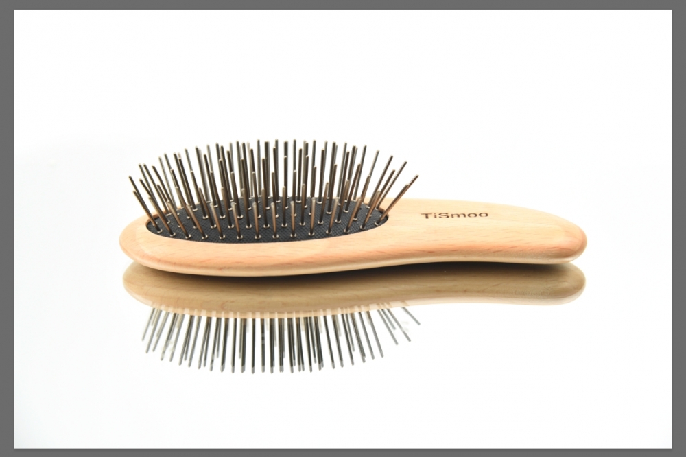 Titanium dolphin-shaped hairbrush